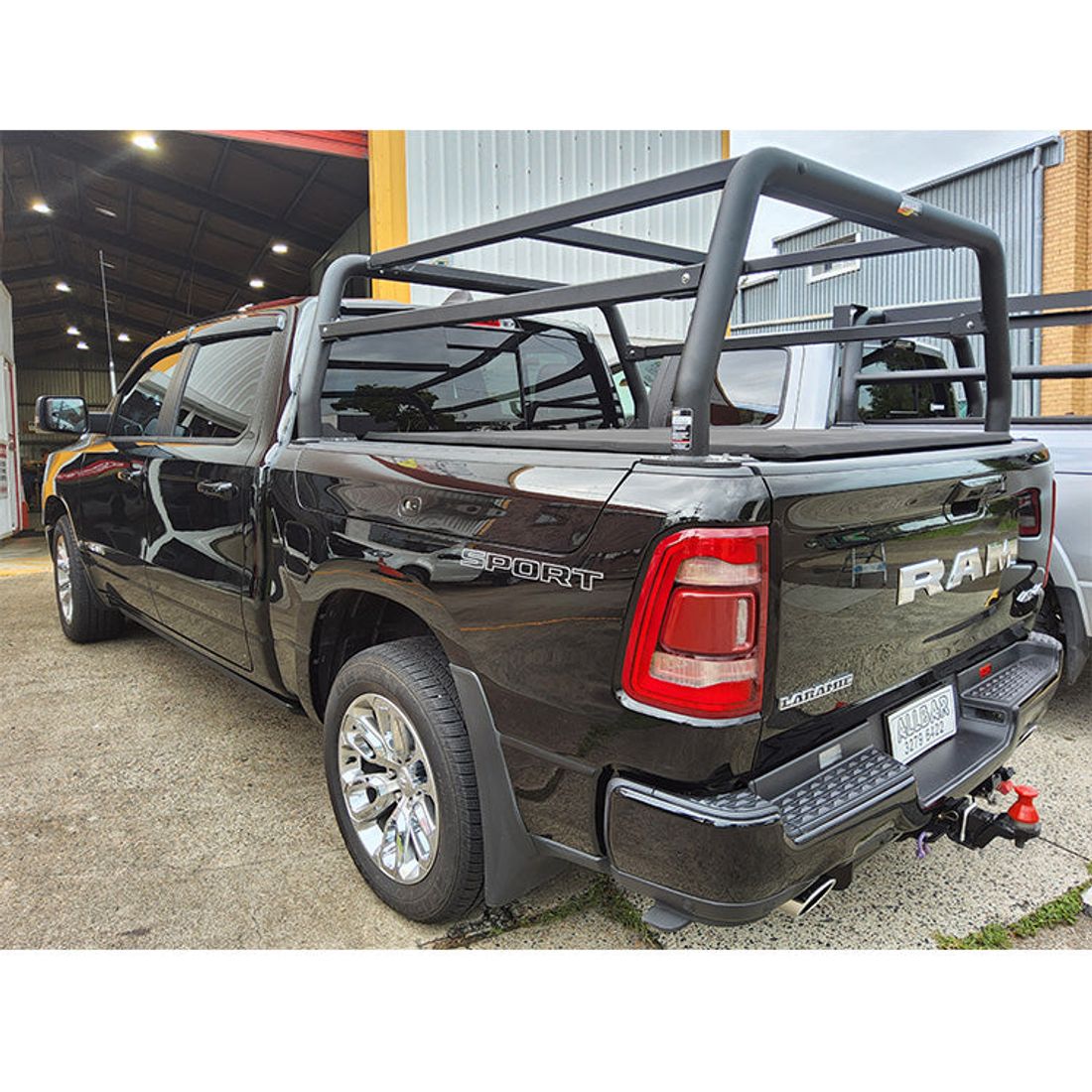 Textured Black 76mm Ladder Racks with Platform and Side Rails to suit 2023 DT Ram 1500 Laramie Sport