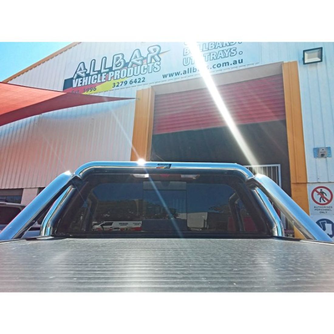 Custom 100mm Polished Sportsbar to suit 2021 GMC Sierra with roller shutter